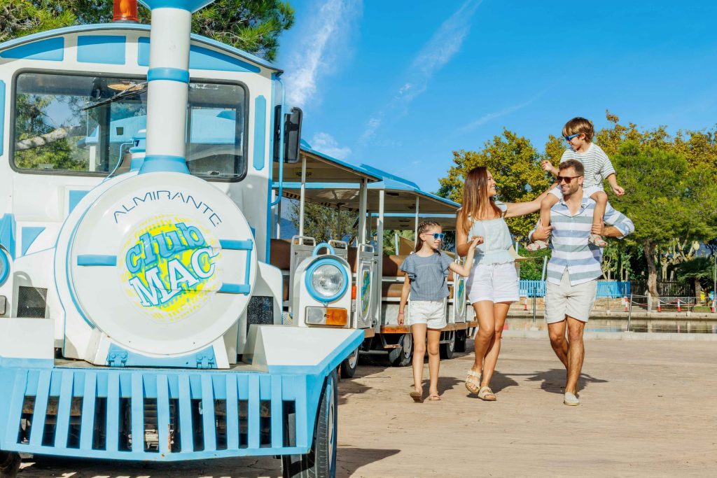 family next to Club Mac's train