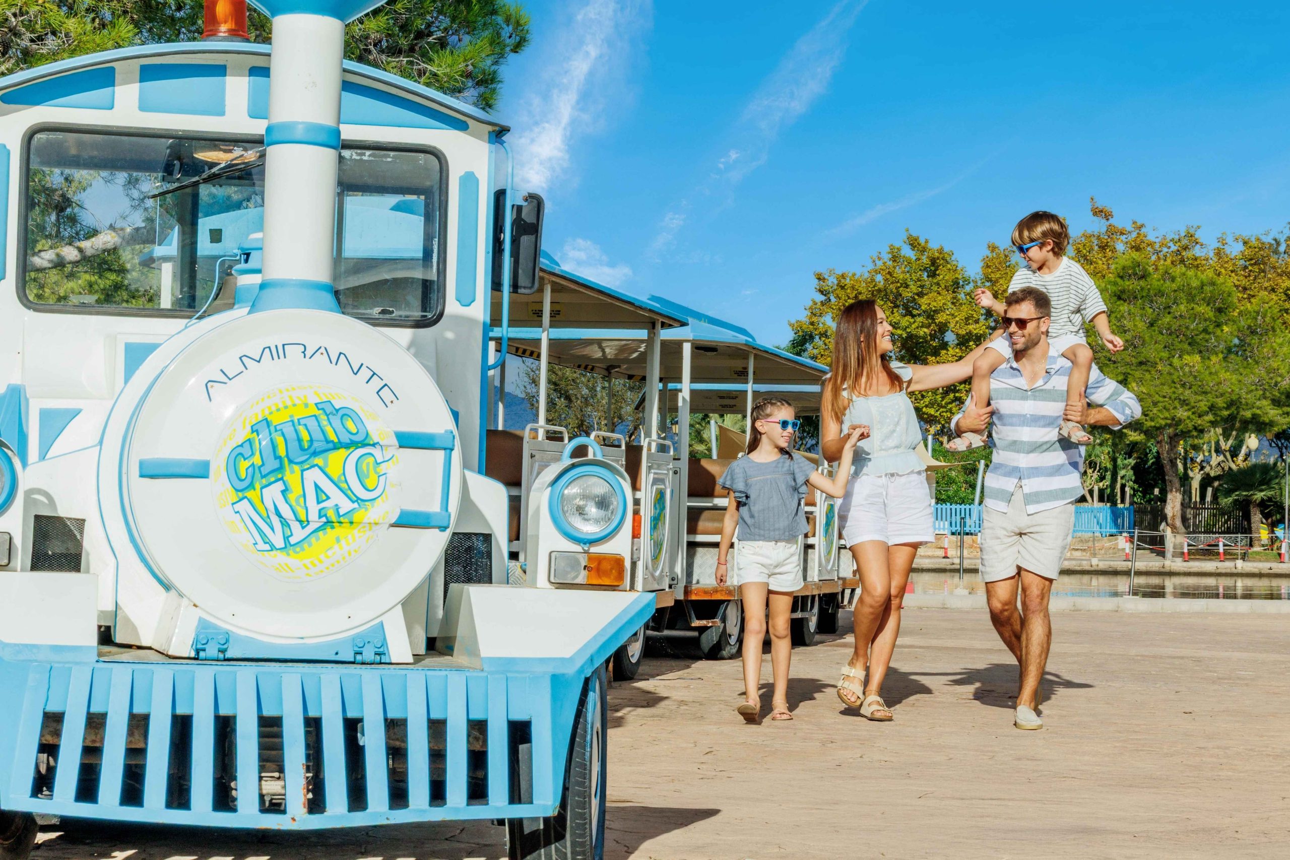 family next to Club Mac's train